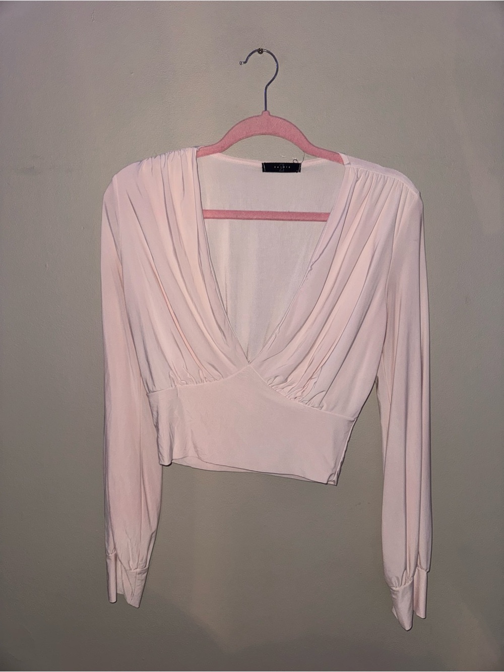 Like new, off white long sleeve blouse, size medium